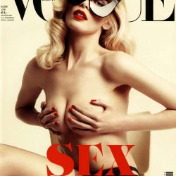 Claudia Schiffer covered topless on Vogue Germany