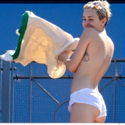 Miley Cyrus Sunbathes Topless
