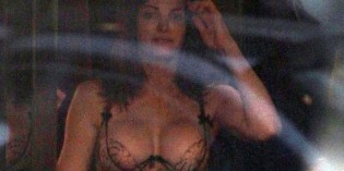 Stephanie Seymour trying on lingerie in italy